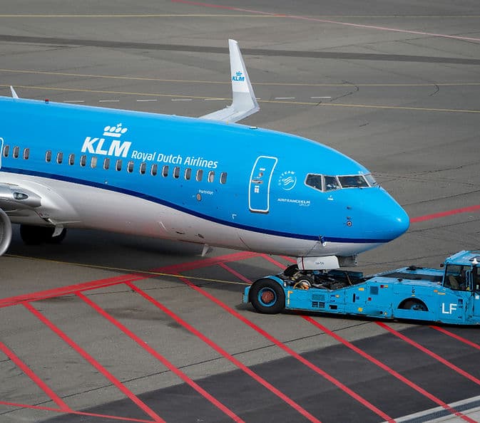 Aircraft with tug operator